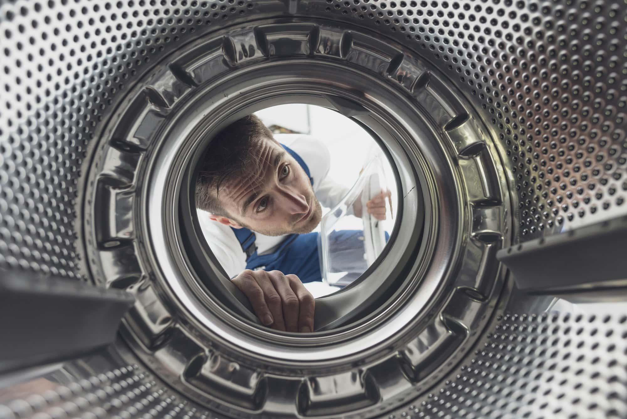 repairman-checking-the-washing-machine