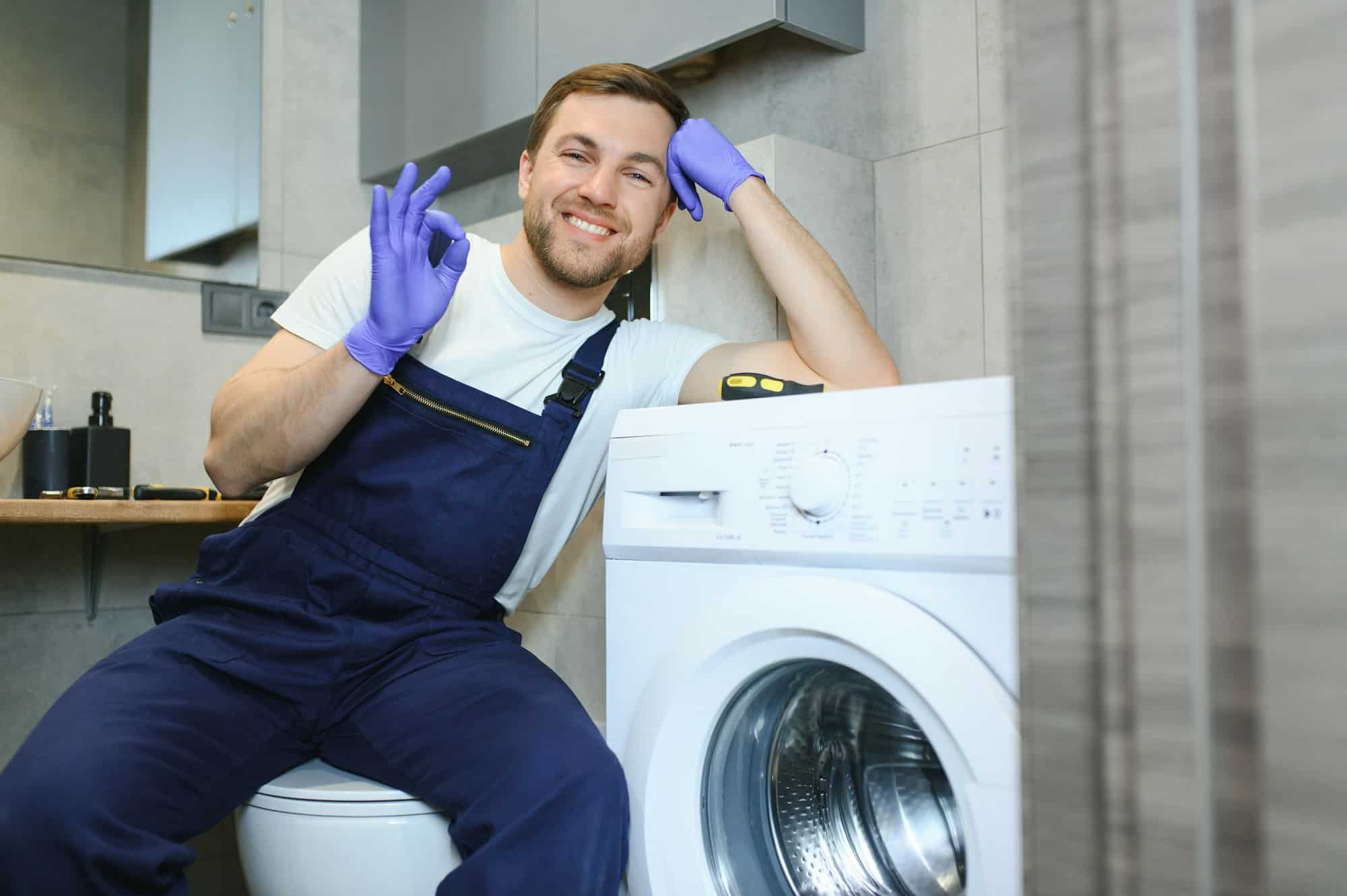 repairmain-is-repairing-a-washer-or-washing-machine-in-a-household
