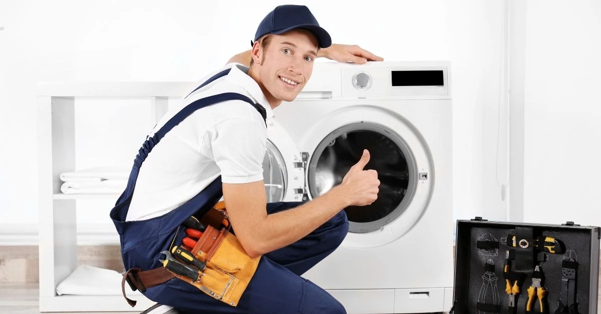 technician-giving-thumbs-up-washing-machine